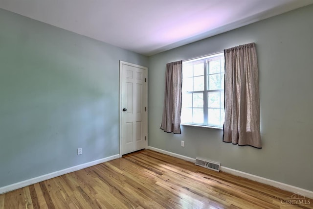 10730 Adventure Ln, Montgomery, OH 45242 - spare room featuring plenty of natural light and wood finished floors