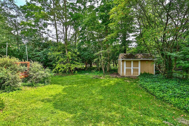 10730 Adventure Ln, Montgomery, OH 45242 - view of grassy yard featuring a storage unit