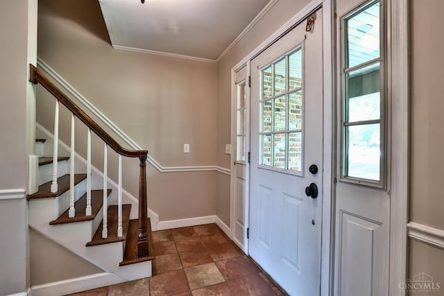 10730 Adventure Ln, Montgomery, OH 45242 - entryway featuring stairs, crown molding, and stone finish flooring