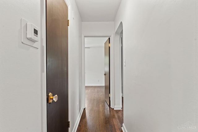 3494 Poole Rd, Colerain Twp, OH 45251 - hallway featuring dark wood-style flooring and arched walkways