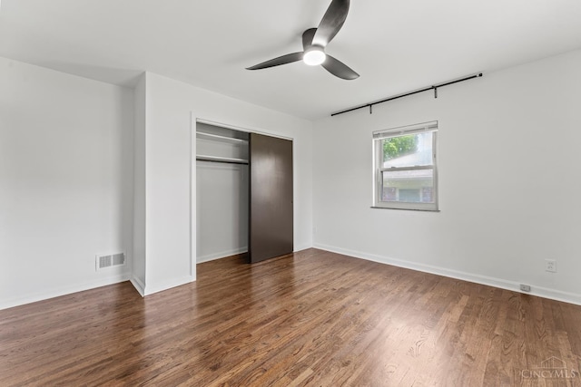 3494 Poole Rd, Colerain Twp, OH 45251 - unfurnished bedroom with a closet, wood finished floors, and a ceiling fan