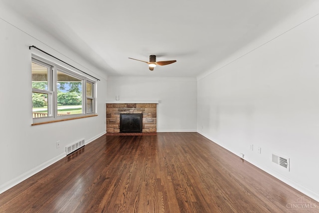 3494 Poole Rd, Colerain Twp, OH 45251 - unfurnished living room with a ceiling fan, wood finished floors, and a stone fireplace