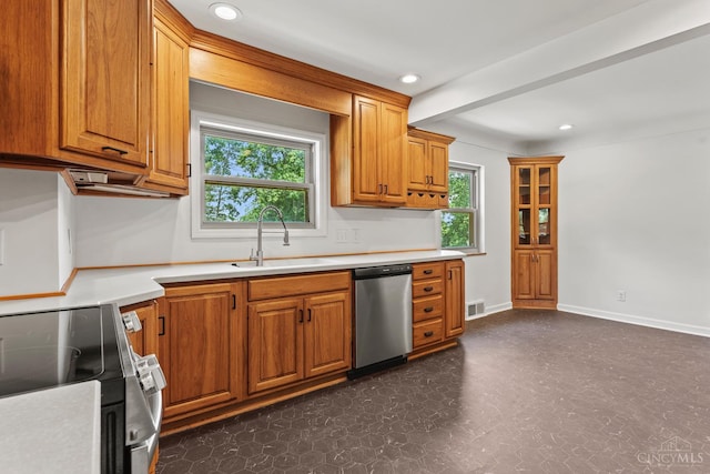 3494 Poole Rd, Colerain Twp, OH 45251 - kitchen with stainless steel appliances, brown cabinets, light countertops, recessed lighting, and dark floors