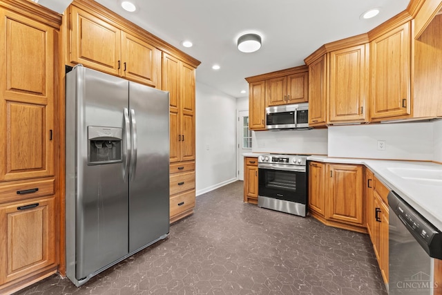 3494 Poole Rd, Colerain Twp, OH 45251 - kitchen featuring appliances with stainless steel finishes, dark floors, recessed lighting, and light countertops