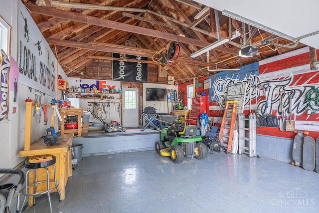 901 W Sunview Dr W, Hamilton, OH 45013 - garage with a garage door opener and a workshop area