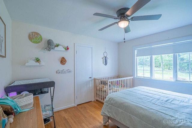 901 W Sunview Dr W, Hamilton, OH 45013 - bedroom with wood finished floors and ceiling fan
