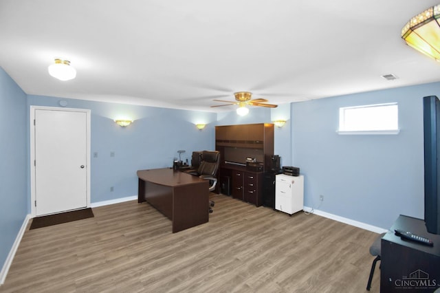 1303 Crotty Ct Unit A, Anderson Twp, OH 45255 - office area featuring a ceiling fan and wood finished floors