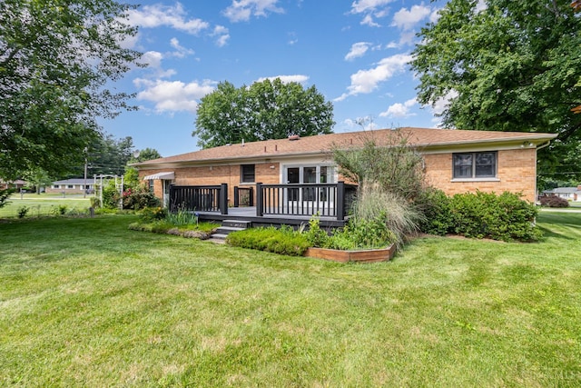 755 Jarole Dr, Union Twp, OH 45245 - view of front of property with a front yard, a wooden deck, and brick siding