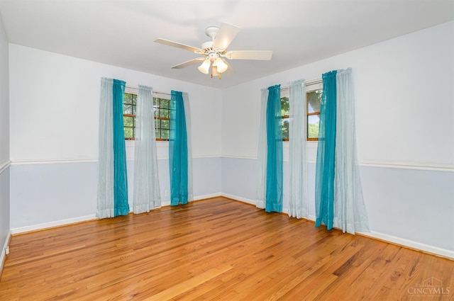 755 Jarole Dr, Union Twp, OH 45245 - empty room with plenty of natural light, light wood-style floors, and a ceiling fan