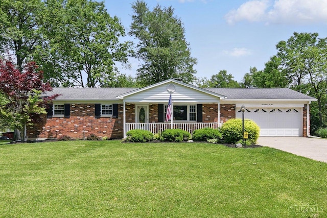 1704 Ludlow Cir, Pierce Twp, OH 45102 - ranch-style house with covered porch, brick siding, a garage, driveway, and a front yard
