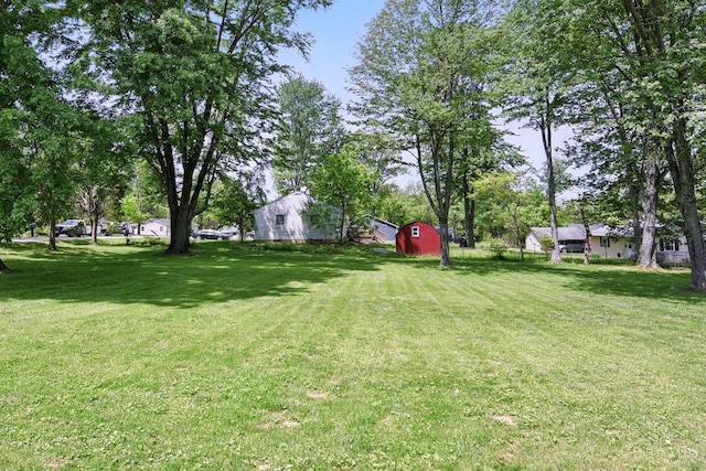 1704 Ludlow Cir, Pierce Twp, OH 45102 - view of grassy yard featuring an outbuilding