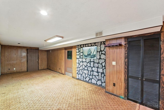 1704 Ludlow Cir, Pierce Twp, OH 45102 - finished basement featuring wooden walls and light carpet
