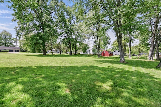 1704 Ludlow Cir, Pierce Twp, OH 45102 - view of green lawn with an outbuilding