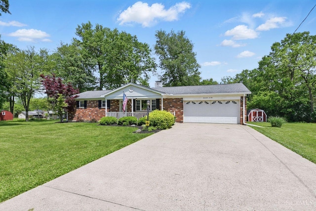 1704 Ludlow Cir, Pierce Twp, OH 45102 - ranch-style house featuring covered porch, a storage unit, a garage, and brick siding