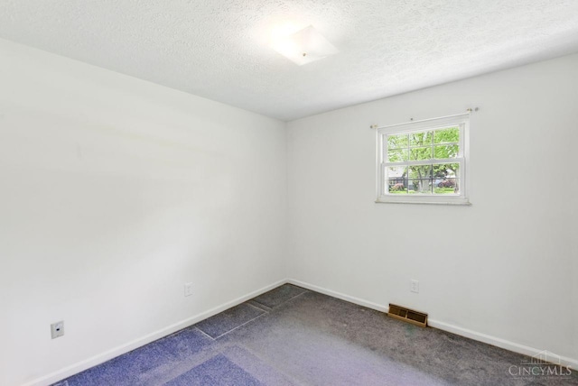 1704 Ludlow Cir, Pierce Twp, OH 45102 - empty room with a textured ceiling and dark colored carpet