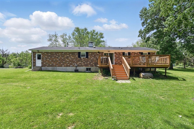 1704 Ludlow Cir, Pierce Twp, OH 45102 - back of property featuring a wooden deck, stairs, a lawn, brick siding, and a chimney