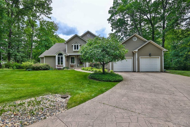 9396 Kemper Grove Ln, Symmes Twp, OH 45140 - view of front facade with driveway, a front lawn, and an attached garage