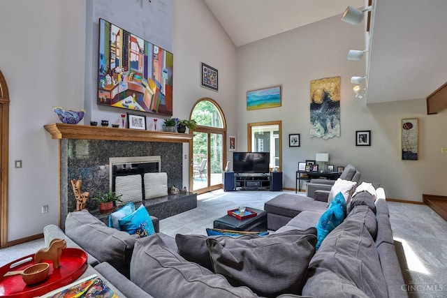 9396 Kemper Grove Ln, Symmes Twp, OH 45140 - carpeted living area featuring high vaulted ceiling and a premium fireplace