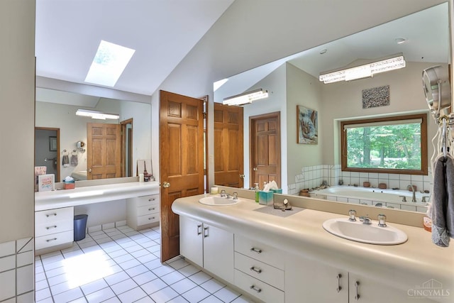 9396 Kemper Grove Ln, Symmes Twp, OH 45140 - full bath with a skylight, tile patterned flooring, high vaulted ceiling, a garden tub, and double vanity