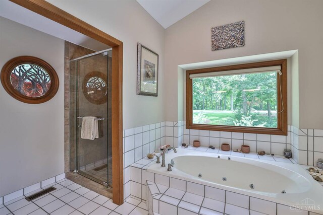 9396 Kemper Grove Ln, Symmes Twp, OH 45140 - bathroom with a shower stall, a tub with jets, vaulted ceiling, and tile patterned floors