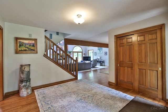 9396 Kemper Grove Ln, Symmes Twp, OH 45140 - foyer entrance with wood finished floors and stairs