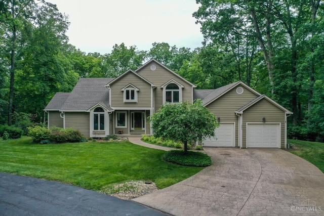 9396 Kemper Grove Ln, Symmes Twp, OH 45140 - traditional-style house featuring concrete driveway, a front lawn, and an attached garage