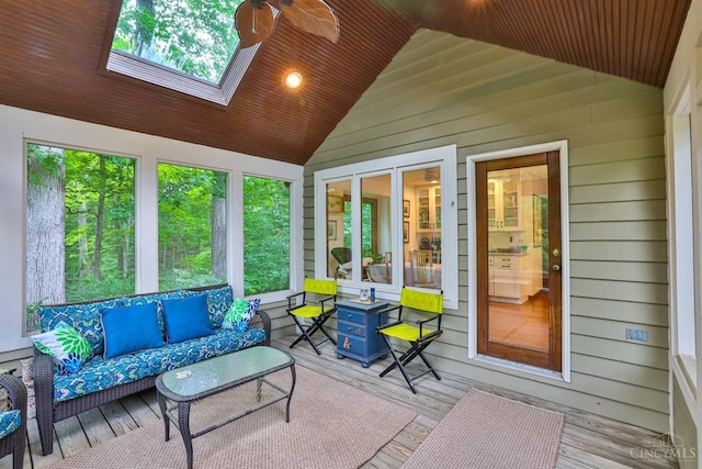 9396 Kemper Grove Ln, Symmes Twp, OH 45140 - sunroom / solarium featuring vaulted ceiling, an outdoor hangout area, a skylight, and healthy amount of natural light