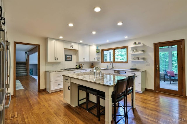 9396 Kemper Grove Ln, Symmes Twp, OH 45140 - kitchen featuring open shelves, light stone countertops, white cabinets, stainless steel appliances, and recessed lighting