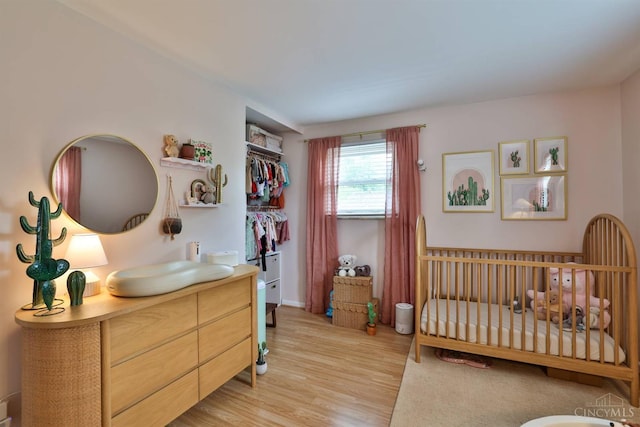 10569 Gloria Ave, Cincinnati, OH 45231 - bedroom with light wood-style floors and a sink