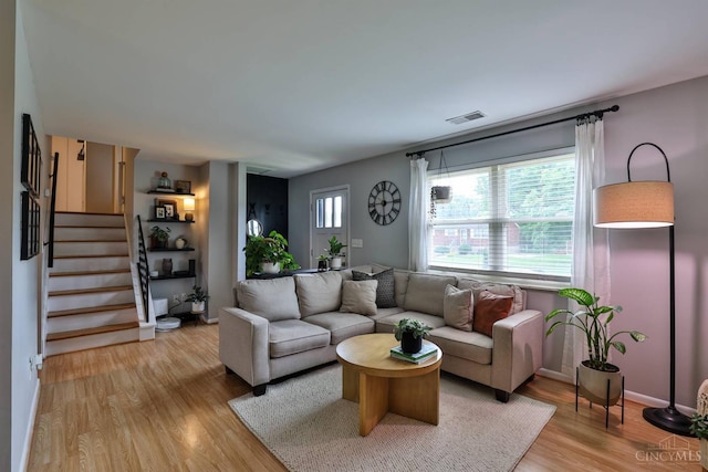 10569 Gloria Ave, Cincinnati, OH 45231 - living room with light wood-type flooring and stairs