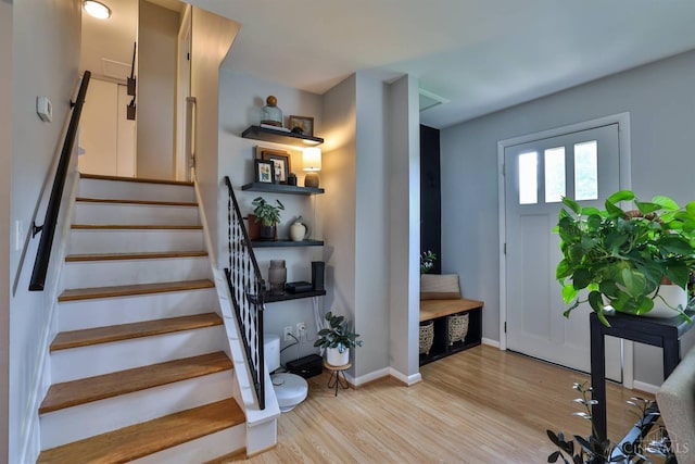 10569 Gloria Ave, Cincinnati, OH 45231 - foyer with light wood finished floors and stairway