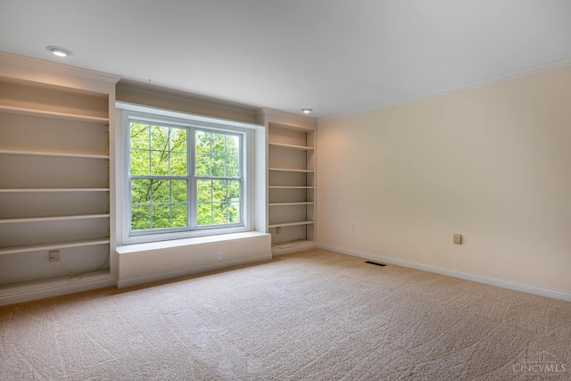 7194 Orchard View Ln, Salem Twp, OH 45152 - carpeted spare room featuring ornamental molding and built in features
