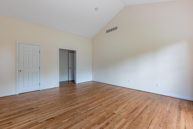 7194 Orchard View Ln, Salem Twp, OH 45152 - unfurnished room with high vaulted ceiling and light wood finished floors
