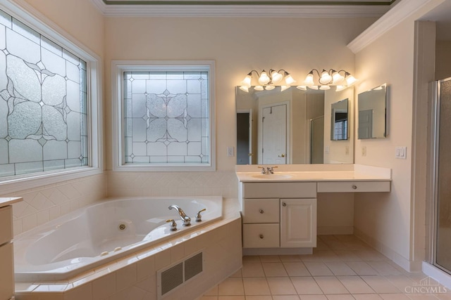 7194 Orchard View Ln, Salem Twp, OH 45152 - bathroom with vanity, a tub with jets, tile patterned flooring, ornamental molding, and plenty of natural light