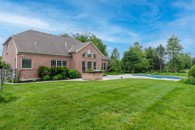 7194 Orchard View Ln, Salem Twp, OH 45152 - back of property with brick siding and a patio