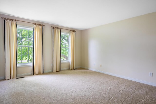 7194 Orchard View Ln, Salem Twp, OH 45152 - empty room with healthy amount of natural light and carpet