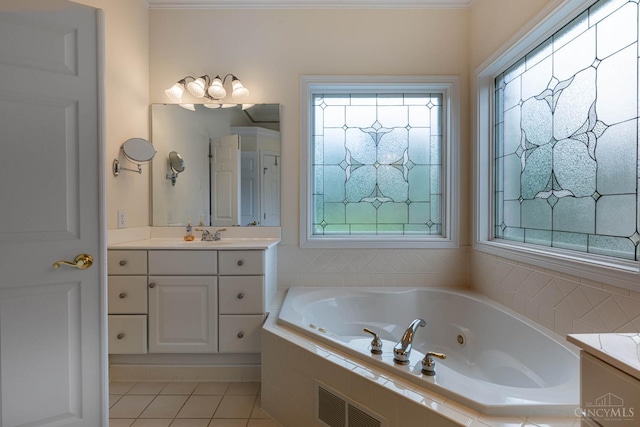 7194 Orchard View Ln, Salem Twp, OH 45152 - bathroom with vanity, a jetted tub, plenty of natural light, and tile patterned floors