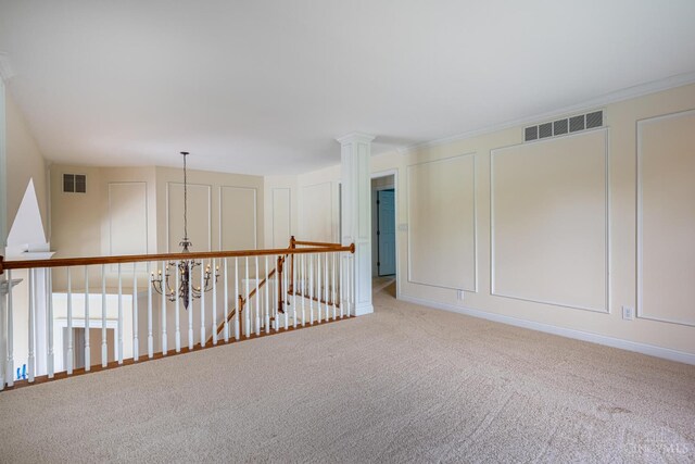 7194 Orchard View Ln, Salem Twp, OH 45152 - carpeted spare room featuring a decorative wall, a chandelier, and ornate columns