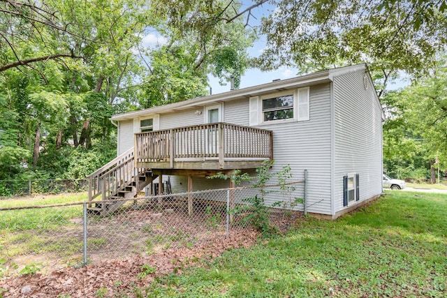 9733 Gertrude Ln, Springfield Twp, OH 45231 - rear view of house with a wooden deck and stairway