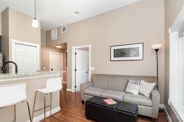 2110 Fulton Ave Unit D1, Cincinnati, OH 45206 - living room featuring a towering ceiling and wood finished floors