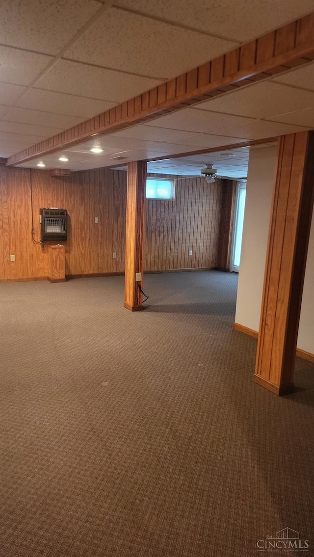 10 Chippewa Cv, Sardinia, OH 45171 - below grade area featuring carpet floors, heating unit, wooden walls, and a drop ceiling