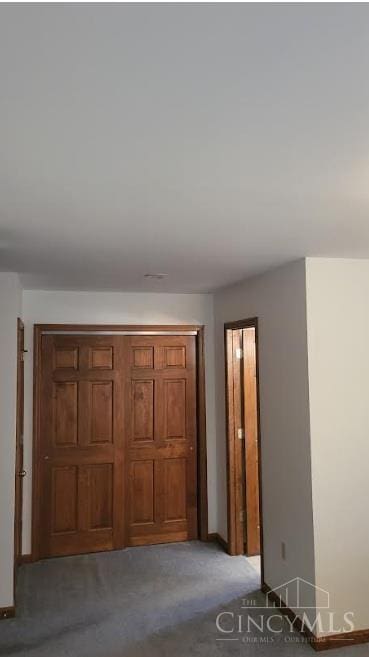 10 Chippewa Cv, Sardinia, OH 45171 - unfurnished bedroom with light carpet and baseboards