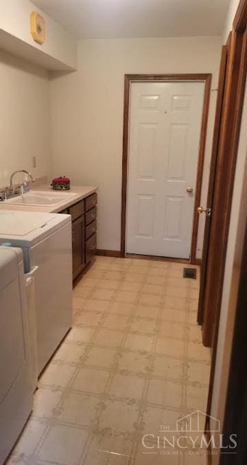 10 Chippewa Cv, Sardinia, OH 45171 - laundry area with cabinet space, light flooring, and separate washer and dryer