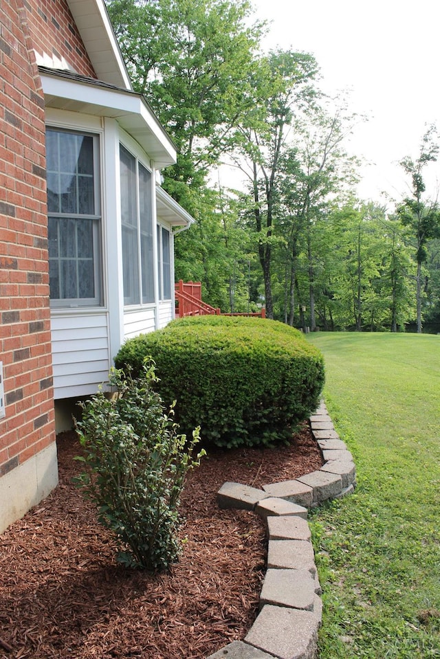 10 Chippewa Cv, Sardinia, OH 45171 - view of green lawn featuring a sunroom