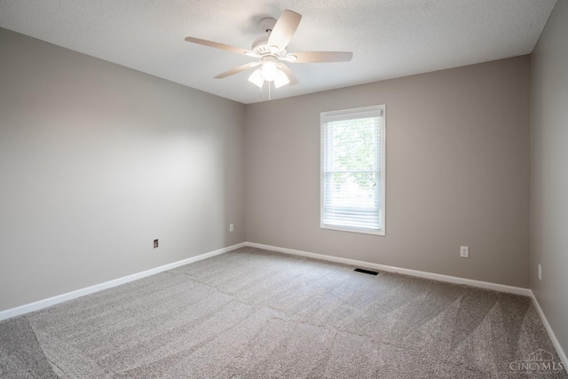 1606 Thall Dr, Hamilton, OH 45013 - spare room with carpet flooring, ceiling fan, and a textured ceiling