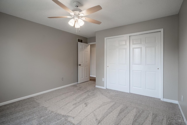 1606 Thall Dr, Hamilton, OH 45013 - unfurnished bedroom featuring carpet, a closet, and ceiling fan