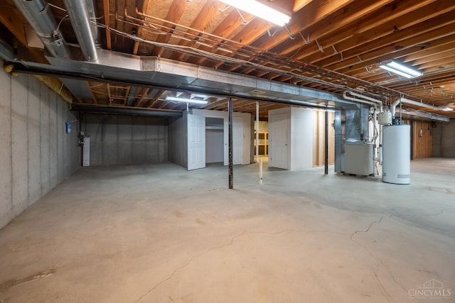 1606 Thall Dr, Hamilton, OH 45013 - unfinished below grade area featuring water heater and heating unit
