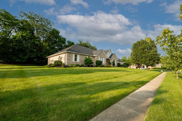1606 Thall Dr, Hamilton, OH 45013 - single story home featuring a front yard and stone siding
