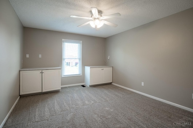 1606 Thall Dr, Hamilton, OH 45013 - unfurnished room with a ceiling fan, a textured ceiling, and carpet floors