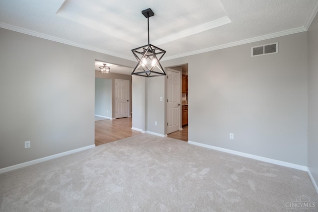 1606 Thall Dr, Hamilton, OH 45013 - unfurnished room with light colored carpet, ornamental molding, and a raised ceiling